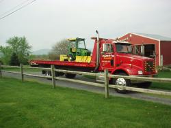 Picking up 322 in PA with friend's 1996
Peterbilt 29' Chevron flatbed.